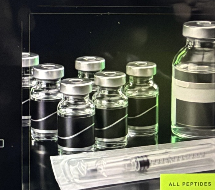 Research vials and sterile syringe